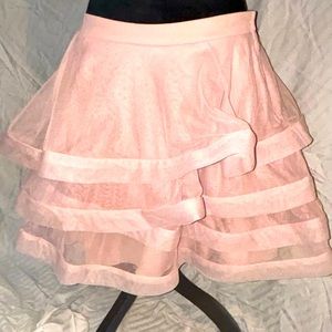 Pink ruffle tiered chiffon skirt.